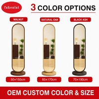 Miroir sur pied ovale pleine longueur Fullkenlight Premium avec cadre en bois et base pour chambre à coucher