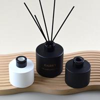Emballage personnalisé 100ml bouteille ronde en verre de diffuseur de luxe vide avec joint de bouchon à vis