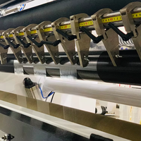 Petite machine de découpe et de rembobinage de rouleaux de papier entièrement automatique avec moteur de pompe PLC Mitsubishi pour opérations en espace limité
