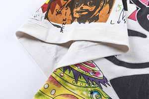 Camiseta de manga corta moderna, elegante, holgada, informal, con estampado de grafiti, versátil, para hombres, mujeres y parejas. - Product Image 3