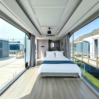 Maison portable de luxe moderne en acier léger, ignifuge, inspirée des capsules spatiales, hôtel préfabriqué, espace de vie extérieur, chambre, salle de bain