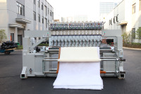 Machine de matelassage professionnelle à grande vitesse multi-têtes machine de matelassage et de broderie à aiguilles multiples machine à coudre lit/vêtements