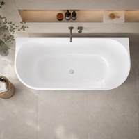 Baignoire autoportante en acrylique pour salles de bain compactes 1300x750mm, design blanc avec rebord fin et intérieur ovale
