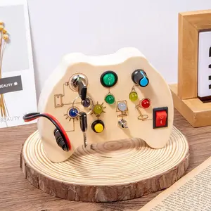 Tablero ocupado de madera eléctrico educativo LED GamePad Montessori luz Led tablero ocupado juguete ligero Led juego de mesa ocupado juguetes para niños