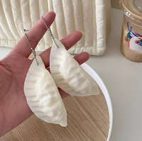Porte-clés Squishy en forme de dumpling, jouet anti-stress en silicone à presser, jouet sensoriel fidget