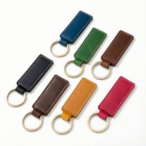พวงกุญแจหนังสังกะสีอัลลอยนูนดีไซน์แบบถักมีหลายสีน้ำหนักเบาสำหรับผู้ชายผู้หญิงหรูหราเฉพาะตัว - Product Image 1