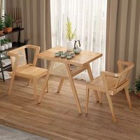 Ensemble de chaises de salle à manger modernes européennes en rotin tressé avec plateau en ardoise et pieds en métal, garantie 1 an, couleur au choix pour la vente en gros
