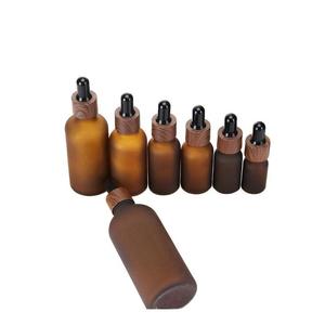 5ml 10ml 15ml 20ml 30ml 50ml <strong>Glass</strong> Frosted <strong>Amber</strong> Essential Oil Eye Liquid <strong>Bottle</strong> with Dark Brown Wood Grain Dropper Cap - Product Image 4