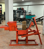 Machine manuelle de fabrication de briques, très prisée au Sénégal, pour la production de briques en argile, optimisant les coûts énergétiques