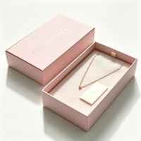 Boîte à bijoux rigide de luxe rose poudré à deux compartiments avec logo personnalisé, doublure en velours nude gaufré, emballage de gros