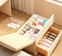 Coiffeuse moderne en bois massif pliable avec rangement dissimulé, miroir LED et coffre-fort, idéale pour chambre et salle de bain