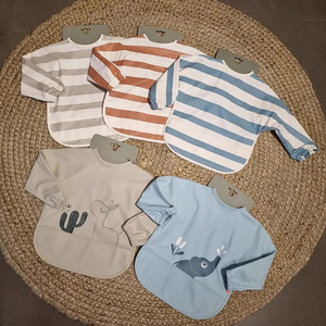 Baberos de bebé de PU personalizados con mangas largas mono de patrón de impresión impermeable fácil limpieza cómodo lindo traje de recién nacido - Product Image 1