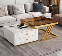Table basse moderne de luxe avec plateau relevable en pierre frittée, tiroir de rangement et structure en métal noir pour salon