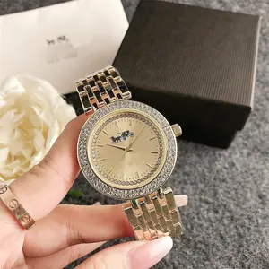 Grosir mewah merek desain pelatih relojes para mujer berlian logam Band wanita wanita jam tangan kuarsa untuk wanita