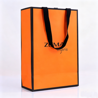 Sacs en papier orange de haute qualité pour vêtements, avec ruban gros-grain imprimé, logo personnalisé, taille et couleur sur mesure, grande capacité, emballage cadeau