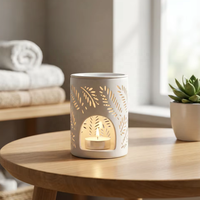Brûleur d'huiles essentielles en céramique blanche moderne, design de fleur creuse, porte-bougie chauffe-plat en porcelaine, diffuseur d'arômes pour la décoration de la maison