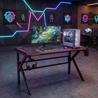 Bureau de jeu pour ordinateur moderne en métal noir en forme de K avec éclairage LED RGB pour ordinateur portable/PC et crochets pour casque