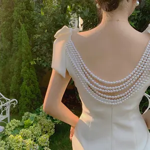 Boutique Wholesale Europe Sexy Pearl Backless Summer New 2022 Bow Slim Solid Color Fashion Sleeveless Women's Dress