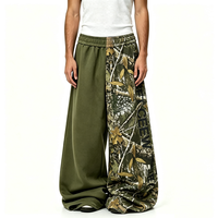 Pantalon de jogging ample pour homme, patchwork vert olive et camouflage feuilles, couleur contrastante, style streetwear, coupe oversize