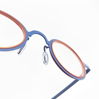 Monture ronde en métal, lunettes élégantes et haut de gamme avec logo personnalisé en usine