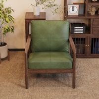 Fauteuil décoratif en cuir de style moderne avec structure en bois massif, confortable pour salon, appartement ou hôtel
