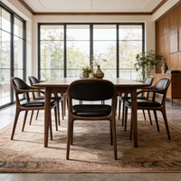 Chaise de salle à manger moderne minimaliste nordique en bois de noyer massif avec dossier en cuir pour la maison, le bar et l'hôtel