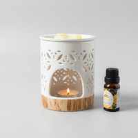 Brûleur d'huiles essentielles en céramique blanche de luxe, motif floral ajouré, support de bougie chauffe-plat, diffuseur de cire aromatique pour la décoration intérieure