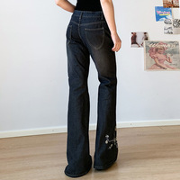 Nouveau pantalon long brodé de plantes légèrement évasé Slim-fit Design Denim Retro Jeans pour les femmes