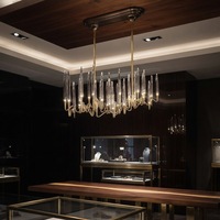 Lustre moderne de luxe personnalisé en acier inoxydable doré avec cristaux, luminaire suspendu linéaire ondulé pour projet hôtelier, salle à manger, villa