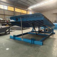 Plateforme élévatrice industrielle automatique pour entrepôts et logistiques, avec fonctions de chargement et de déchargement