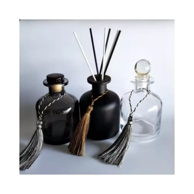 Decorative 50ml Aromatherapy Bottle with Cap Round Shaped black Glass Reed Diffuser Car Room Diffuser Glass Bottle With Lid