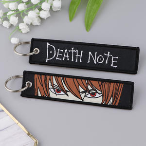 Porte-clés en tissu brodé avec motif de dessin animé Blue Lock et Death Note, décoration artistique tissée - Product Image 1
