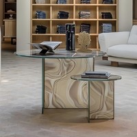 Table basse ovale en verre transparent à motif tourbillonnant, plateau asymétrique, modèle vague, style contemporain de luxe pour la maison