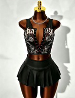 Ensemble jupe 2 pièces sexy pour femme : haut court sans manches à lacets et mini-jupe taille haute en similicuir patchwork
