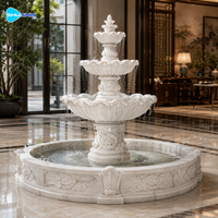 Fontaine en marbre de style chinois entièrement personnalisable avec motif de lotus pour jardin extérieur, solution de sculpture tout-en-un
