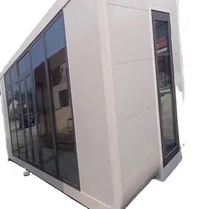 A7 Luxury Modern Prefab Container House Green Steel Space Capsule Inspired Design for Hotels and Camping Moving Glass House