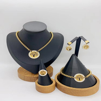 Plaqué or 18 carats collier en os de serpent boucle fleur pendentif collier boucles d'oreilles bracelet bague en acier inoxydable ensemble de bijoux pour femmes