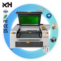 Máquina de Grabado y Corte Láser CO2 KH-7050 con Sistema de Control Ruida y Enfriador de Agua para Materiales No Metálicos