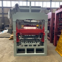 Machine à fabriquer des blocs de ciment hydraulique automatique QT4-15, faible taux de défaillance, production continue pour usine de briques commerciale