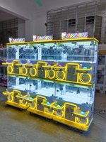 Nouvelle machine à grue Mega Mini 4 joueurs avec certification CE, 110/220V, construction en métal et plastique, puissance 200W pour centres de jeux