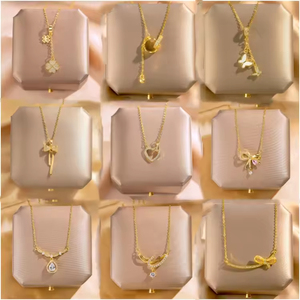 Vintage paslanmaz çelik altın kaplama yonca uzun püskül yay kolye kolye kadınlar için parlak kalp beyaz kabuk kelebek kolye - Product Image 1