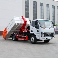 Camion benne SINOTRUK 10 roues avec système de levage hydraulique pour la gestion des déchets commerciaux et les centres de recyclage