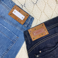 Étiquette en cuir synthétique métallisé gaufré avec logo personnalisé, prête à l'emploi, de haute qualité, tendance, pour jeans en denim, fabriquée en Chine