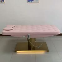 Table de massage en cuir synthétique Eusokon Spa Furniture, chaise de traitement clinique, fauteuil de soin du visage, lit de beauté électrique courbé.