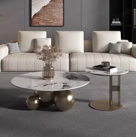 Table basse de luxe au design moderne, avec base sphérique en acier inoxydable et finition miroir, pour salon et hôtel