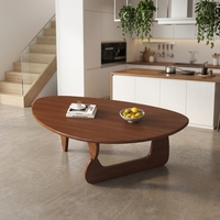 Table basse en bois massif de design japonais avec plateau en forme d'alien pour salon et balcon au style minimaliste moderne