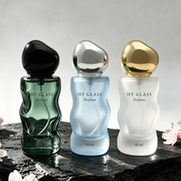 Flacon de parfum en verre sculpté unique de 50 ml, transparent, avec bouchon en métal noir, or, argent, atomiseur de parfum unisexe