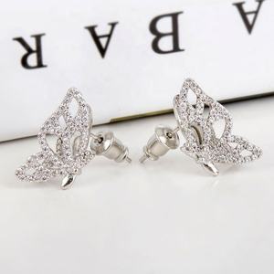 Boucles d'oreilles tendance asymétriques en forme de papillon, cuivre incrusté de zircon, style coréen Dadongmen, cadeau de la Saint-Valentin pour femmes, fabriqué en laiton - Product Image 4