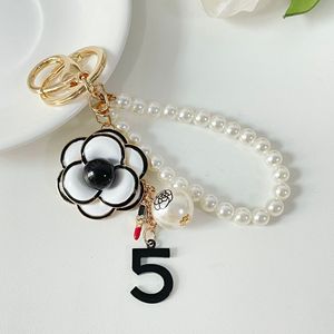 Kawaii Y2K Pearl <strong>Sakura</strong> <strong>Flowers</strong> Keychain Korean Metal <strong>Flower</strong> Bag Pendant Handbag Charms Sweet Girls Bag Hanging Decoration - Product Image 5
