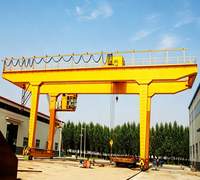 Grue portique à double poutre modèle MG montée sur rail avec palan électrique à câble métallique